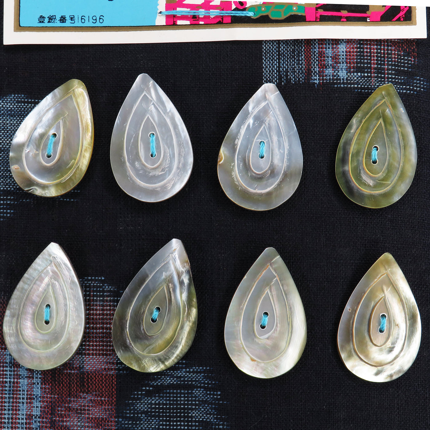 BU-240 eight mother of pearl buttons